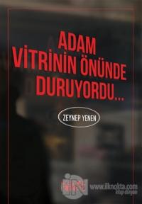 Adam Vitrinin Önünde Duruyordu