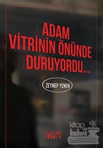 Adam Vitrinin Önünde Duruyordu